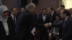 Maxime Gauin shakes hands with Numan  Kurtulmuş, the Deputy Prime Minister of Turkey